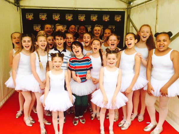 Ollie Jochim (Billy), Todd Bell (Michael) and two casts of Ballet Girls at West End Live 2015