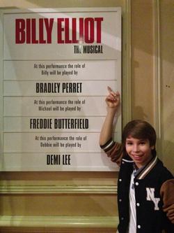 Bradley Perret in front of the Cast Board (Resize)