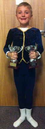 Thomas With Some of his Dance Awards