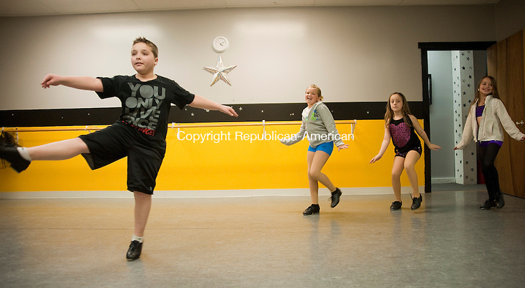 PLYMOUTH, CT 29 APRIL 2013--042913JS06-Charles Pelletier, 10. of Plymouth, dance with other students in his tap class at Reach for the Stars Dance Studio in Plymouth on Monday. Pelletier recently appeared on the Lifetime TV reality show "Dance Moms".  Jim Shannon Republican-American